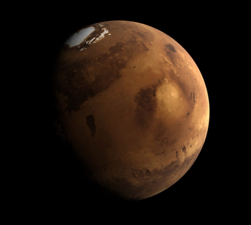 An artists' image of the planet Mars, with a large white arctic area situated at its South Pole.
