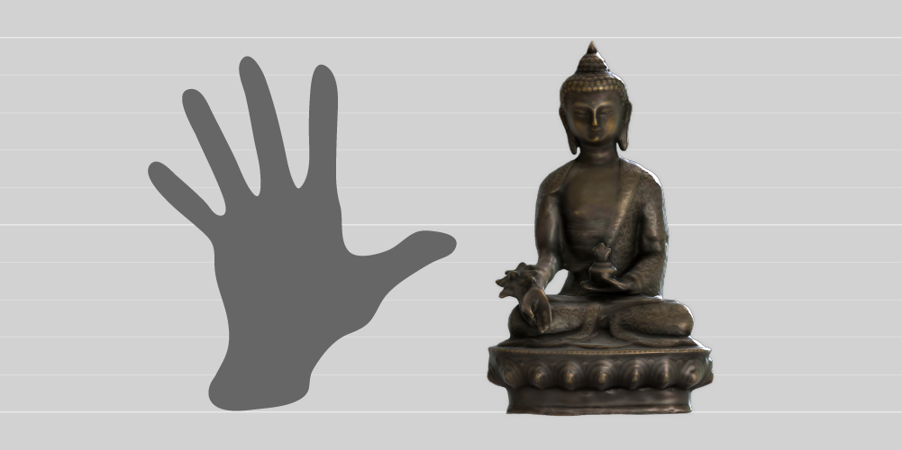A comparison in size between a 19cm-long adult hand and the 20cm-tall Buddha statue. 