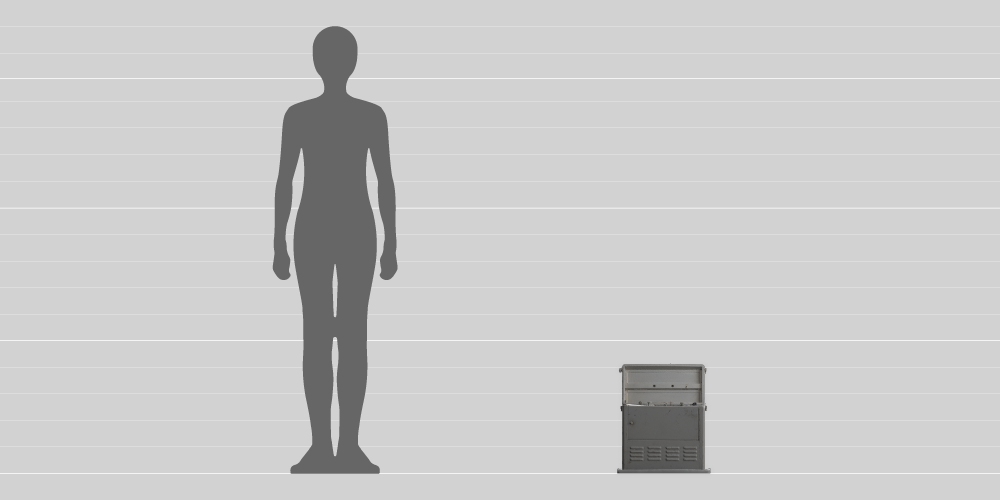 A comparison in height between a 1.8-metre-tall human and the 45cm-tall machine to measure brain waves (with its lid open). 