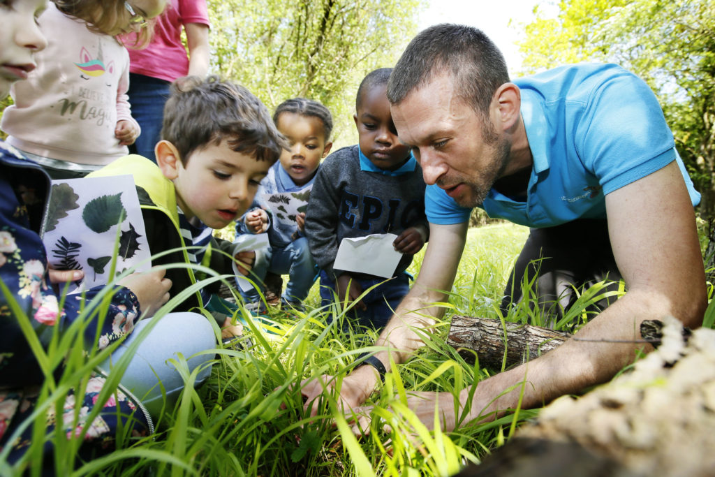 Roger Baker with an Early Years group on a “Wild Walk” in our woodland at the Science Oxford Centre