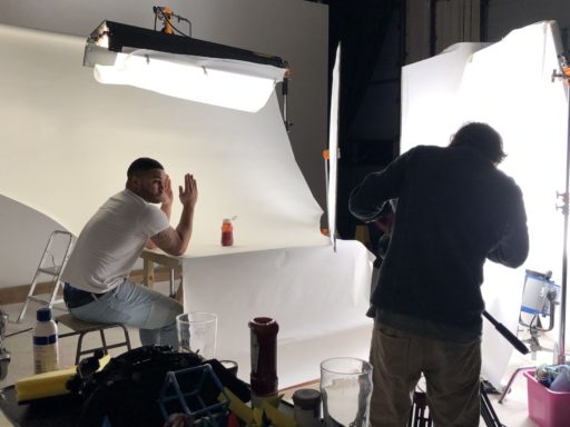 On set, our model, Jordan, gets ready to film the Rocket Mice video's ketchup bottle squeeze.