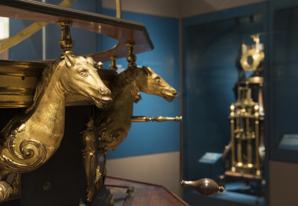Gallery View of Science City 1550-1800: The Linbury Gallery featuring a close up of the golden horses that form part of the giant orrery.