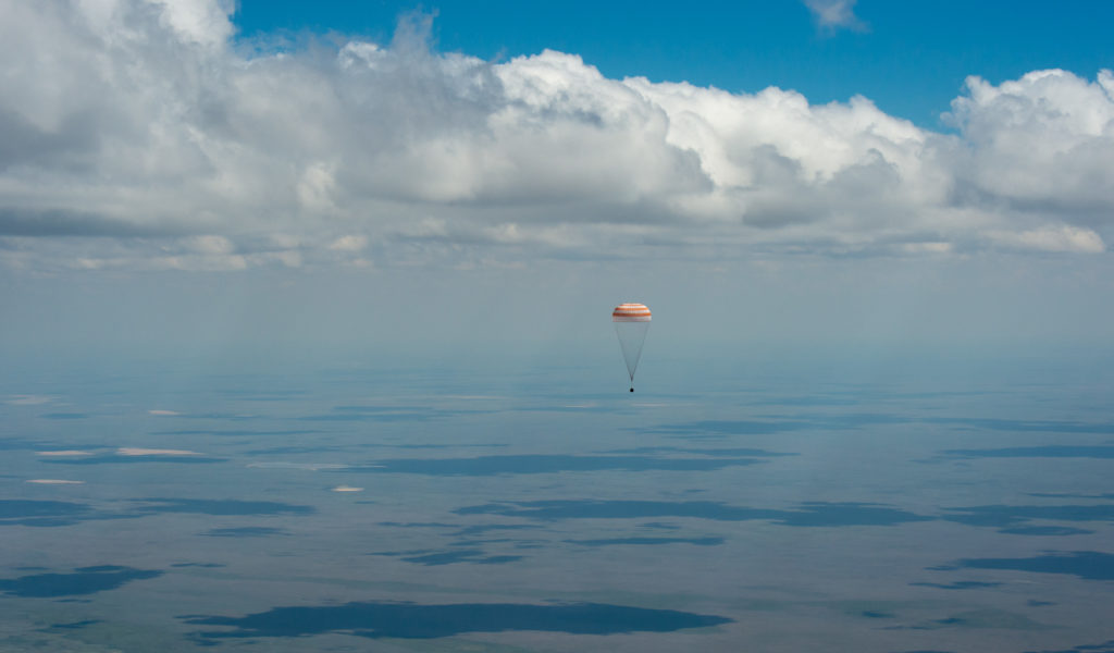 The Soyuz TMA-19M spacecraft is seen as it lands with Expedition 47 crew members Tim Kopra of NASA, Tim Peake of the European Space Agency, and Yuri Malenchenko of Roscosmos near the town of Zhezkazgan, Kazakhstan on Saturday, June 18, 2016. Kopra, Peake, and Malenchenko are returning after six months in space where they served as members of the Expedition 46 and 47 crews onboard the International Space Station. Photo Credit: (NASA/Bill Ingalls)